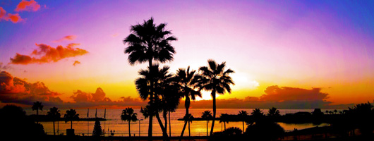 Vista del tramonto sulla spiaggia di Amadores