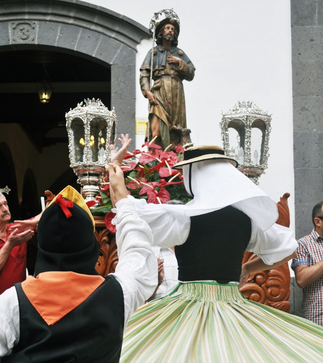 Procession of the religious figures of San Roque and the Virgin of El Rosario at the Fiestas of San Roque, Firgas