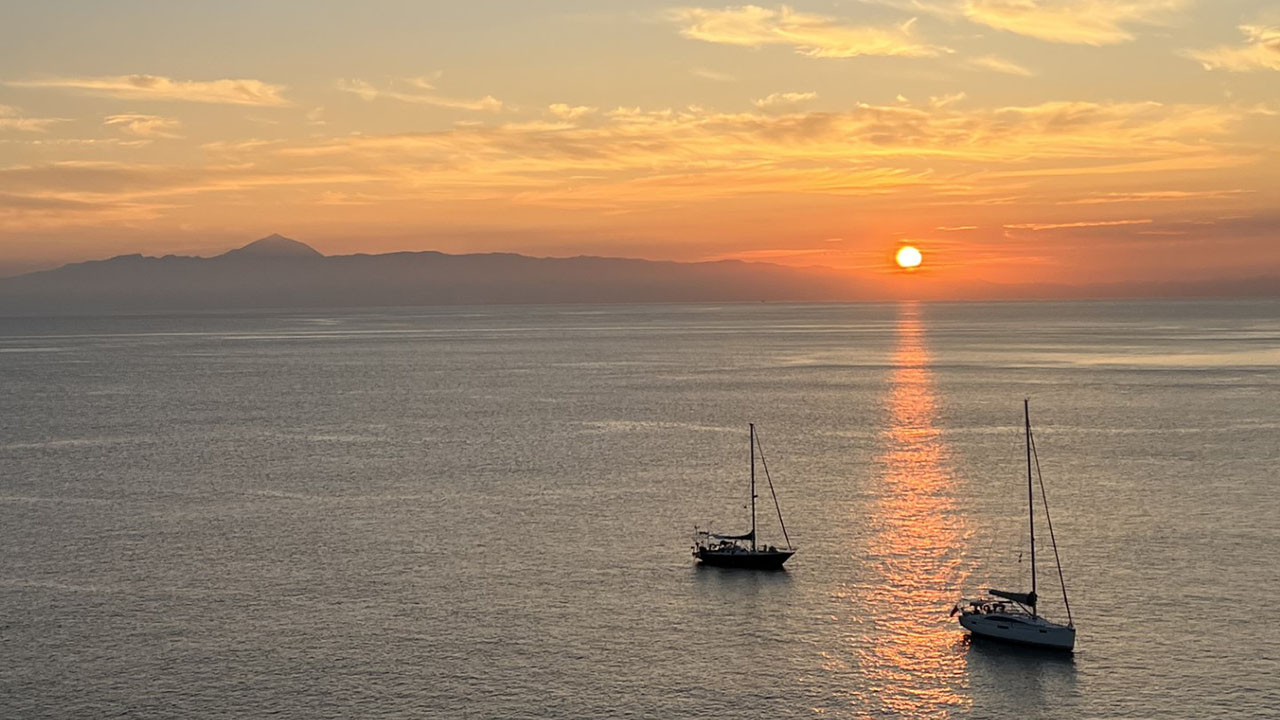 View of El Teide, on the neighbouring island of Tenerife. Sunset in North Sardina, Gáldar. 