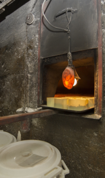 Close up of a wood fire oven where marzipan is cooked