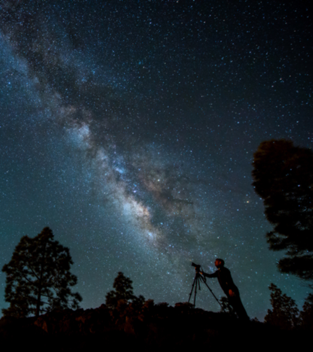 A person observing the starlit sky over Gran Canaria