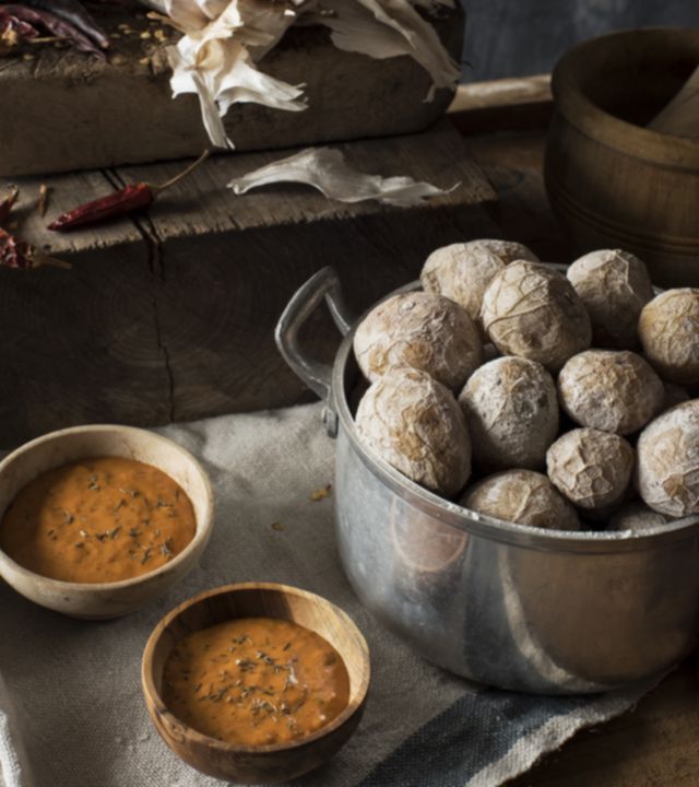 Papas arrugadas con mojo (Small Potatoes Boiled in Their Jackets with Mojo sauce)