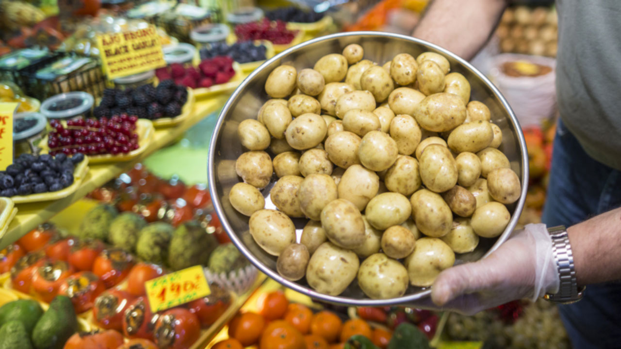 Potatoes on display at a market store