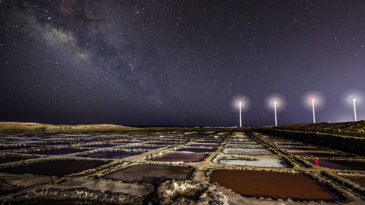 Star-filled skies seen from salt marshes