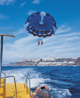 A couple doing parascending