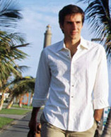 Young person next to the lighthouse at Maspalomas